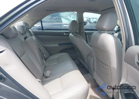 2006 Toyota Camry Le from USA, damaged, VIN JTDBE30KX63041661